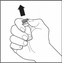 Mano che afferra un dispositivo medico con un tappo nero rimovibile e una sezione trasversale visibile