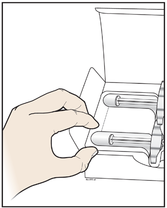 Mano che afferra un dispositivo medico bianco con due cilindri metallici cromati all