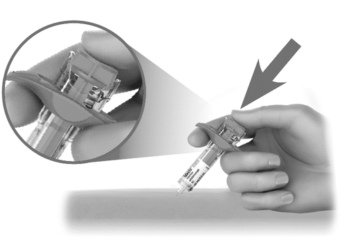 Mano che tiene un autoiniettore con l