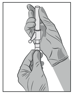 Mano con guanto che tiene e manipola un dispositivo penna per iniezione sottocutanea con ago visibile